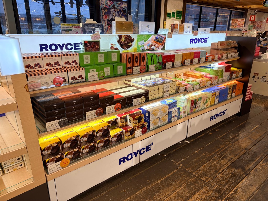A dedicated Royce' chocolate section with a wide variety of boxed chocolates and snacks.